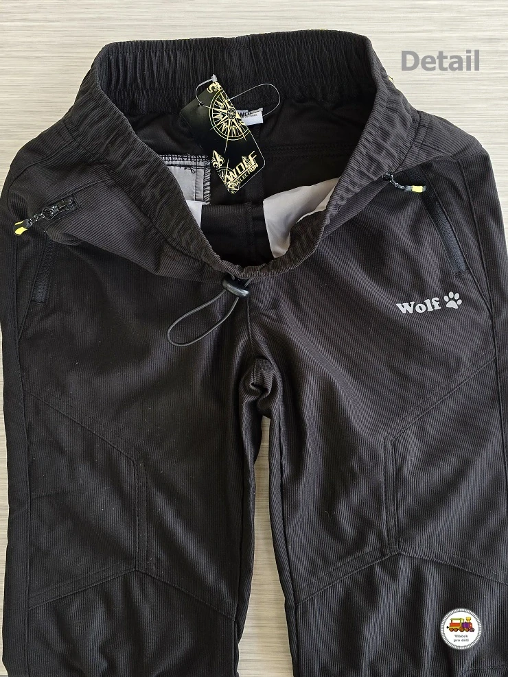 Kalhoty sportovní (manšestrové) Wolf T2551 černé s modrou vel.158